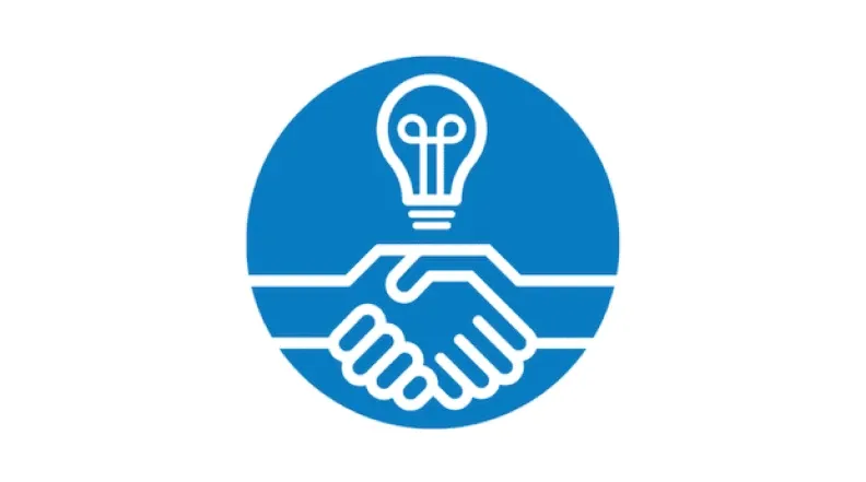 Two hands shaking with a lightbulb above, showing how NGOs can use QR codes for improved campaigns.