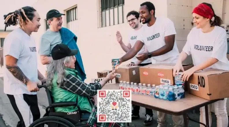 People engaging in charity activities with a QR code, facilitating donations.